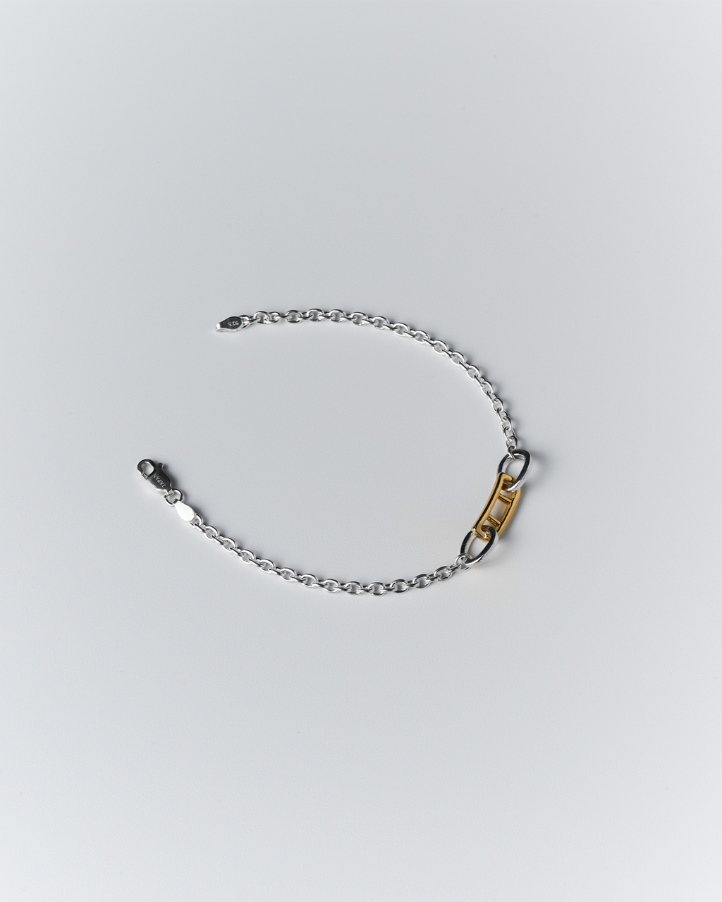 Kutsuwa bridge bracelet SV925×K14 gold